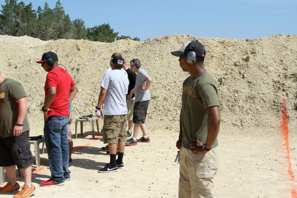 Jason serving as a range safety officer with fellow soldiers and their families.